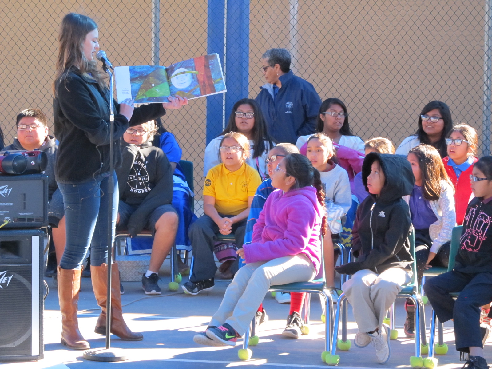 Volunteer reading to children