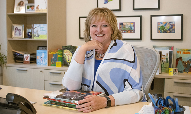 CEO Alicia Levi at her desk