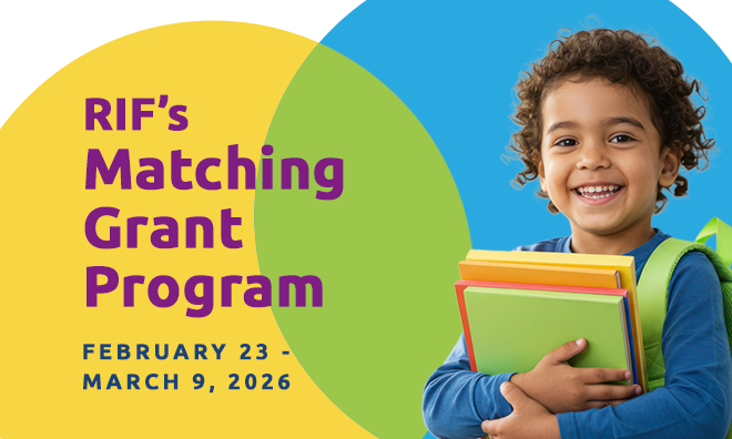 Smiling child with books