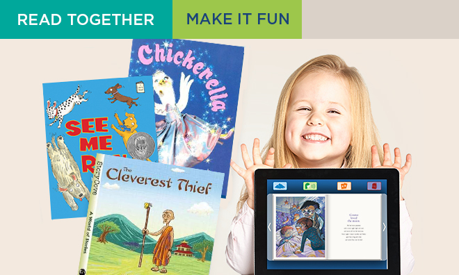 Smiling child holding a tablet with Skybrary app on