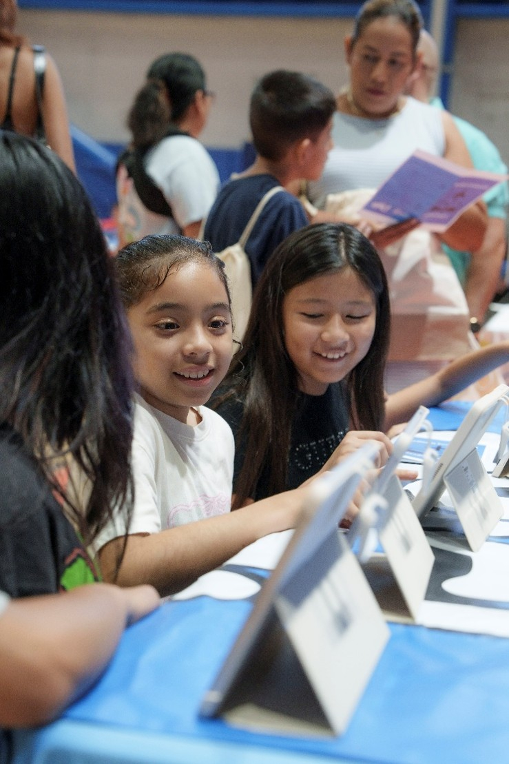Kids reading on tablets
