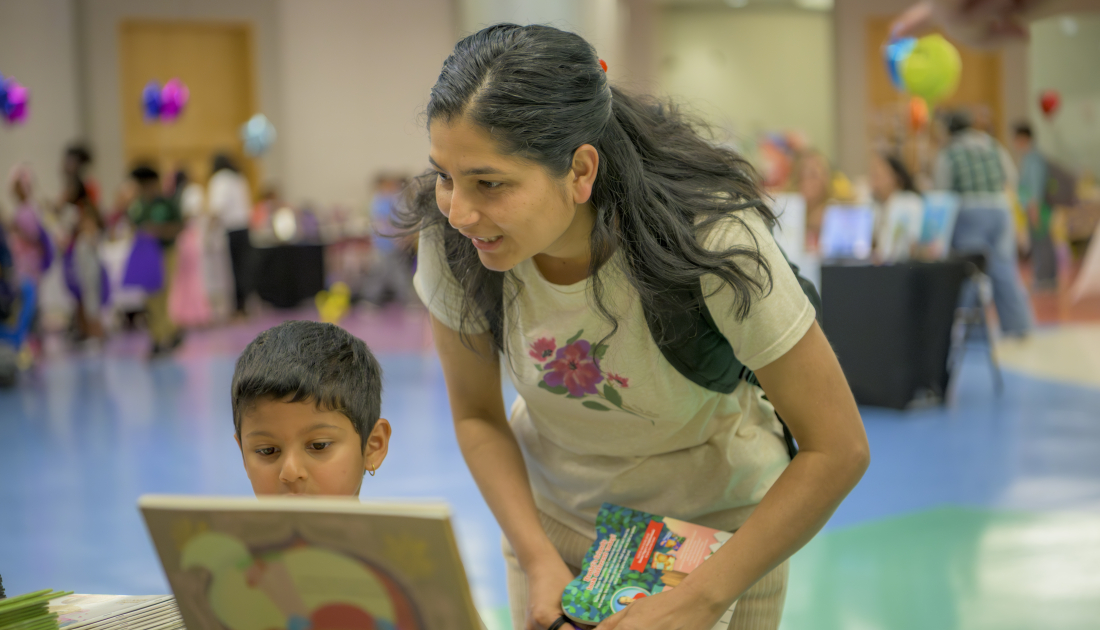 children looking at books