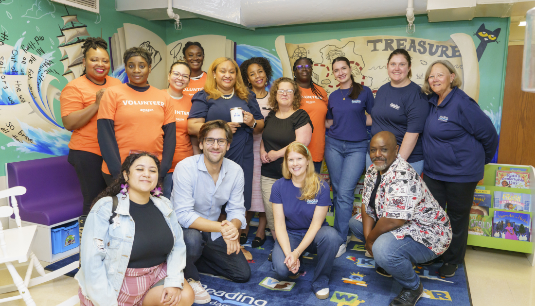 RIF and Amazon staff posing with author