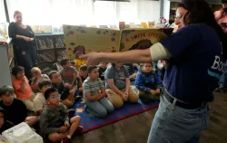 Kids engaged in a book event