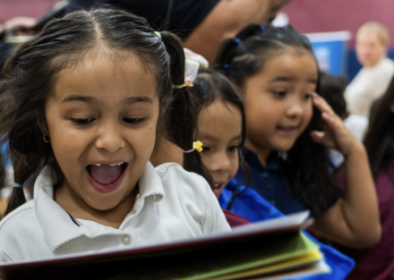 Girl receiving RIF books