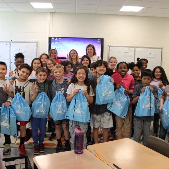 Students with literacy kits