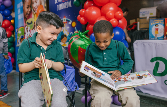 2 boys feeling the joy of reading