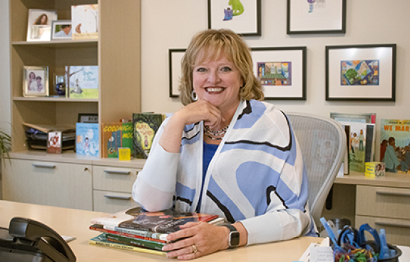CEO Alicia Levi at her desk