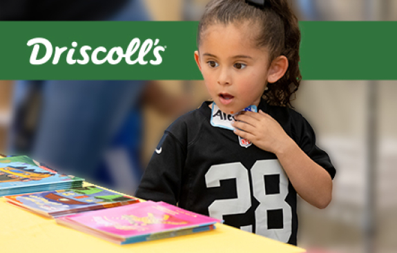 girl amazed by books