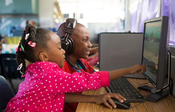 Two kids enjoying skybrary together