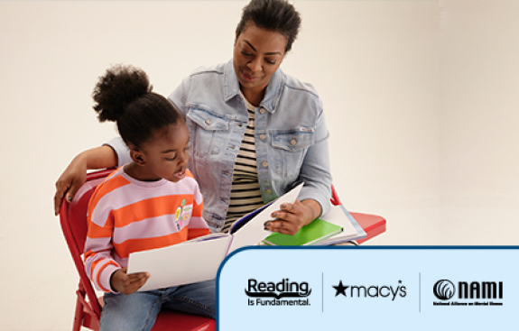 Mom and child reading a book together