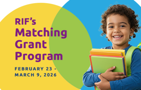 Smiling child with books
