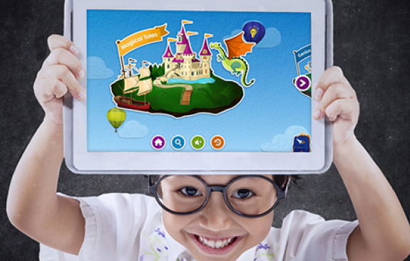 Child holding up a tablet with Skybrary