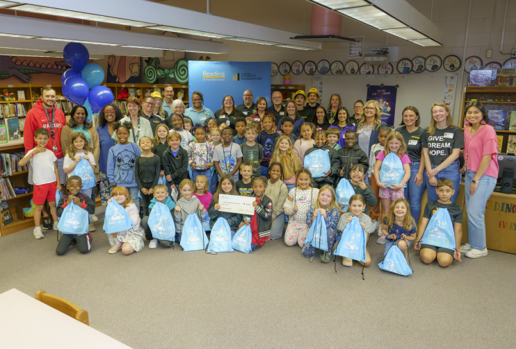 Children participating at RIF and Dollar General book event posing for the camera