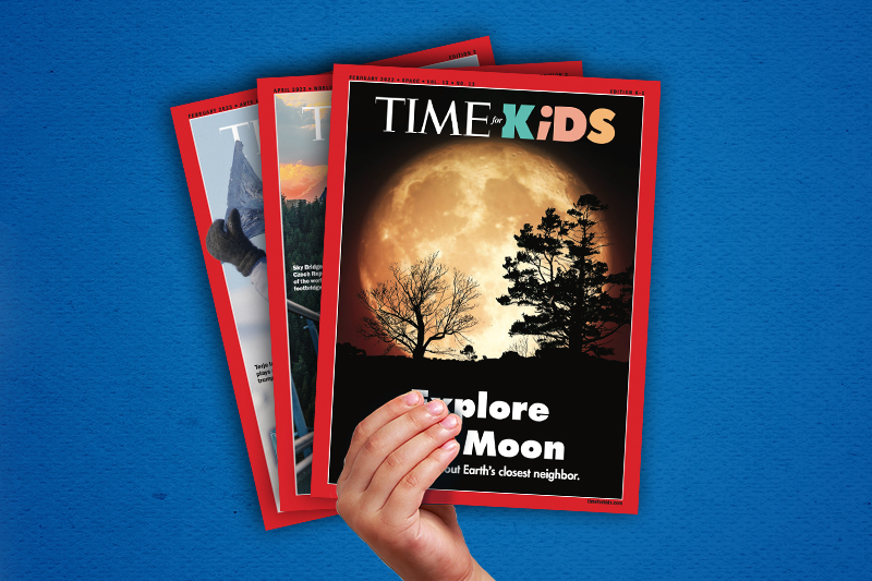 A hand holds up three issues of Time for Kids magazine