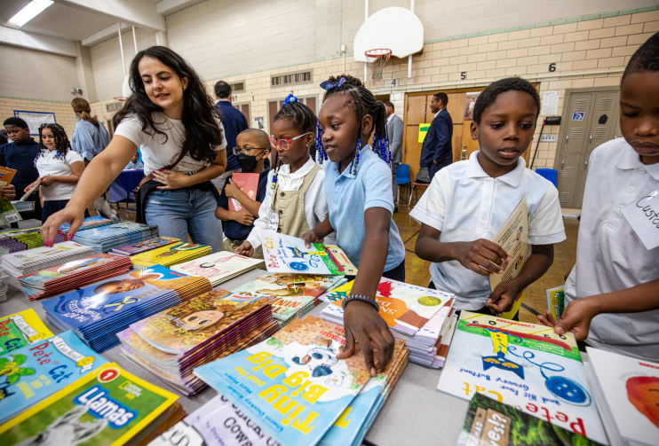 children students book celebration